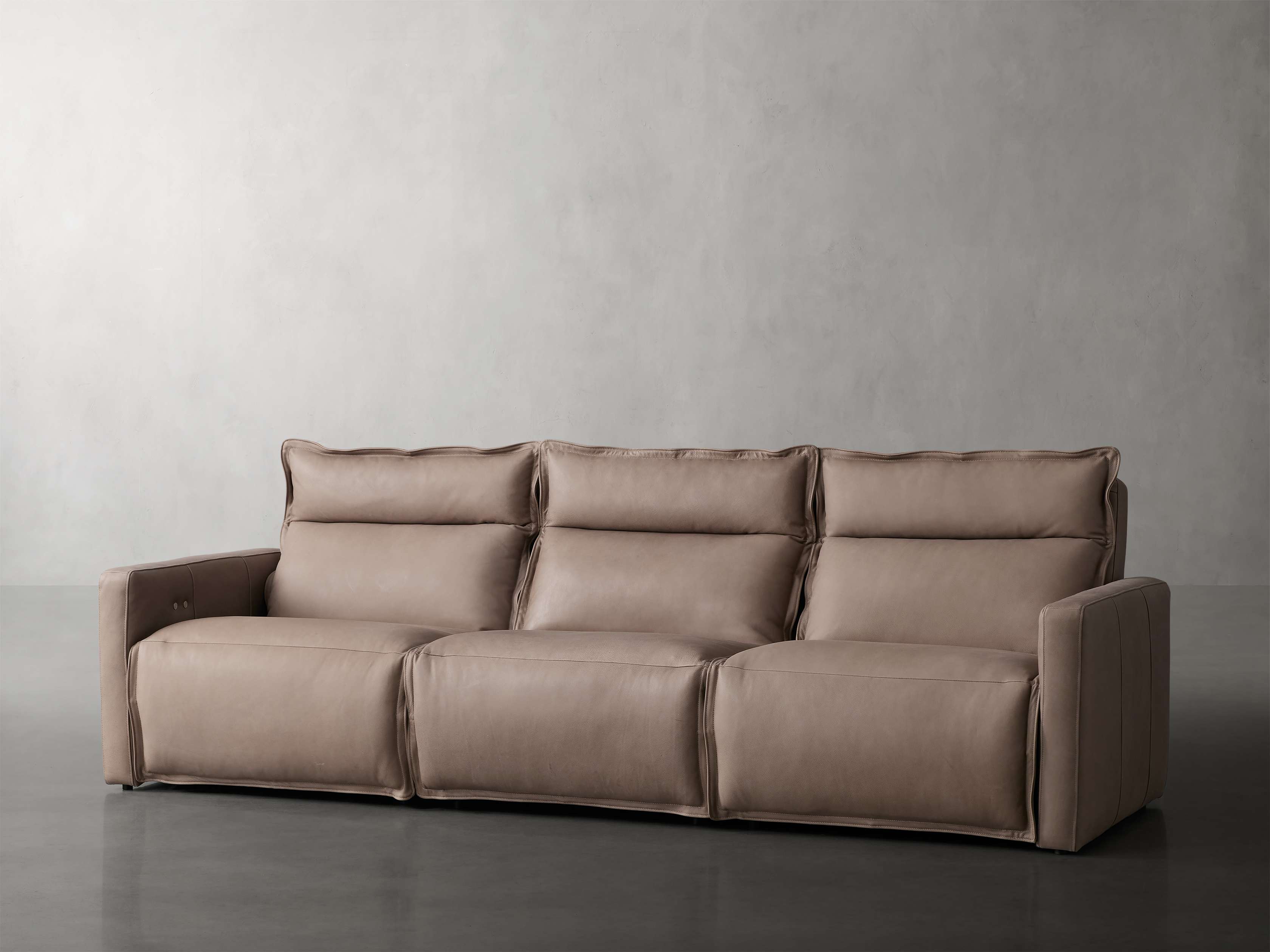Rowland Leather Three-Piece Motion Modular Sofa