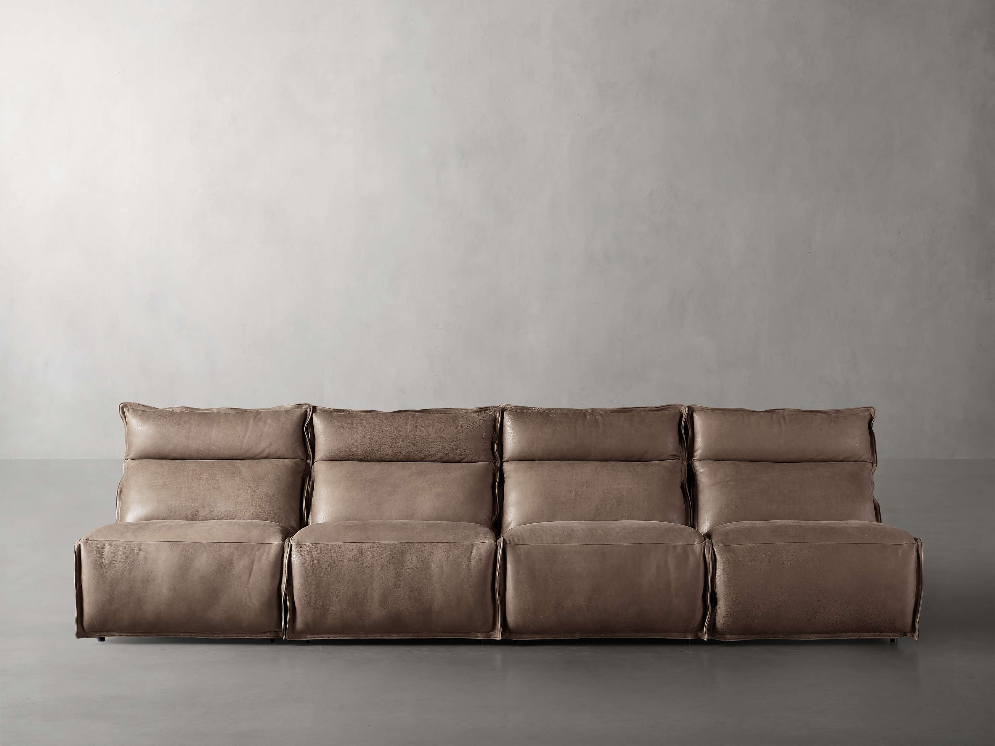 Rowland Leather Four-Piece Armless Motion Modular Sofa