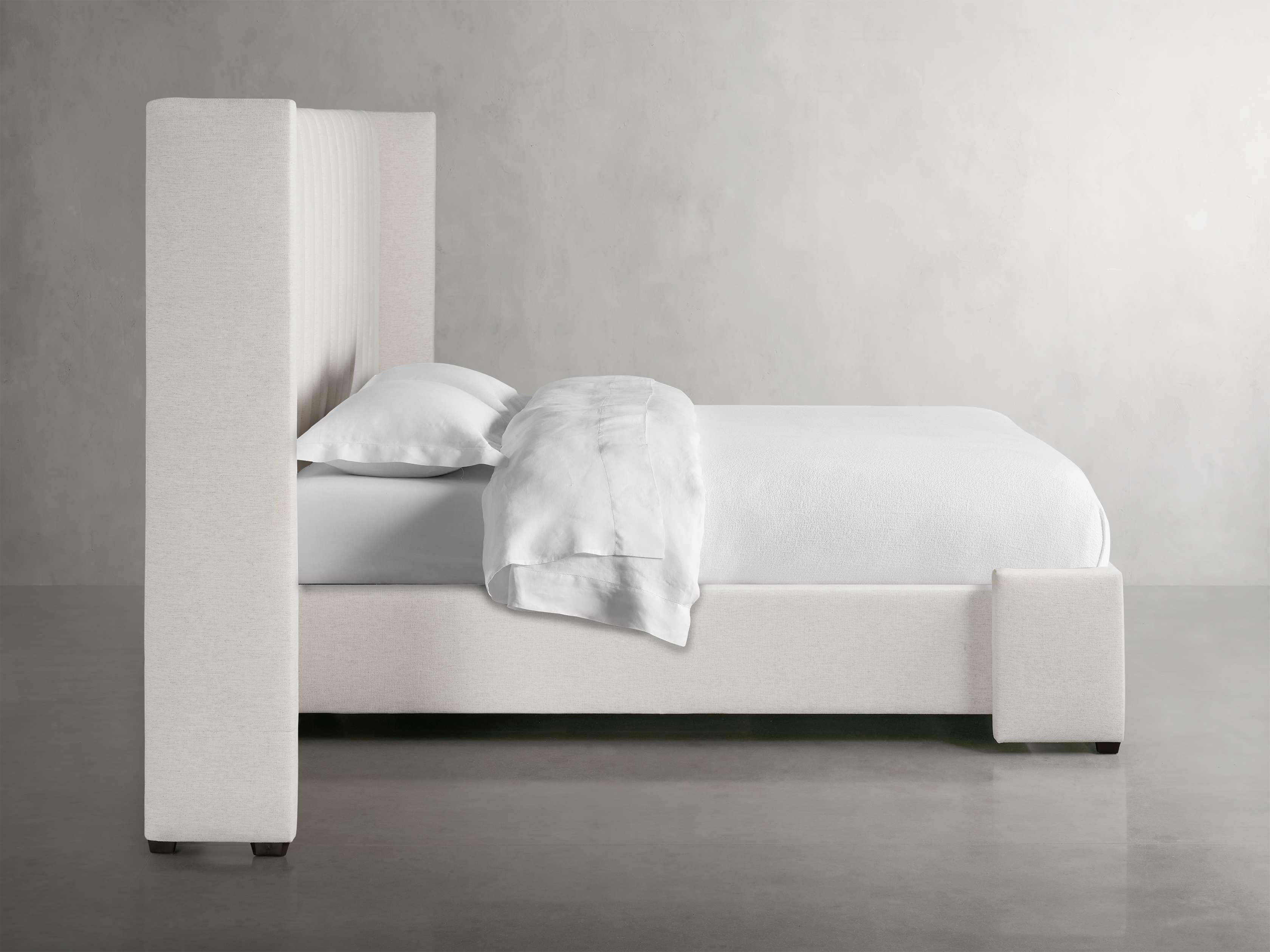 Wyller Channel-Stitched Extended Headboard Bed with Low Footboard